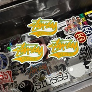 STUSSY WORLD TRIBE STICKER YELLOW