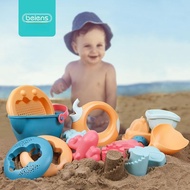 playful beach accessories for babies sand toys, watering can, and beach ball