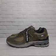 New Balance 2002R Protection Pack "Dark Moss" Shoes