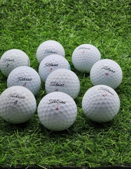 ลูกกอล์ฟมือสอง เกรด บี รุ่นธรรมดาTitleist Garde B  White/color สภาพ 80% 10Pcs.