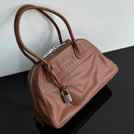 Musey Boston Bag Cowhide Bowling Bag Glossy Cowhide Brown Embossed Lock Boston Bag Bowling Bag Pillo