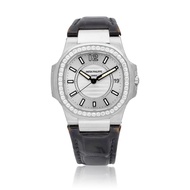 Patek Philippe Patek Philippe Nautilus (Reference 7010G-001). A white gold and diamond-set quartz wr