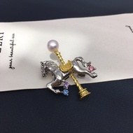 Natural freshwater pearl Year of the Horse carousel brooch