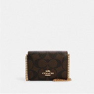 Coach 6650 Mini Wallet On A Chain In Signature Canvas (IMAA8) กระเป๋าสตางค์ผู้หญิง สี Brown Black