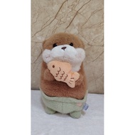 Otter Holding Fish Plush Toy