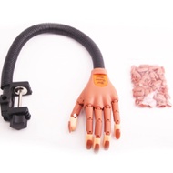 Articulated prosthetic hand used to learn how to do nails