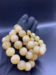 สร้อยข้อมือลูกปัดกลมโอปอลเหลืองธรรมชาติ (13-14MM) Natural Yellow Opal round beaded bracelet (13-14MM
