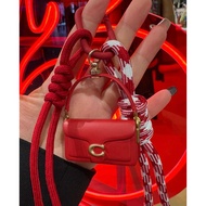 C0 ACH BAG CHARM RED LIMITED EDITION