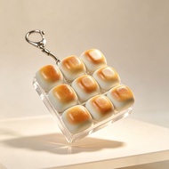 Caramel Bread Stress Relief Toy – 3x3 Grid Squeeze Fidget, Adorable Backpack Charm & Popul