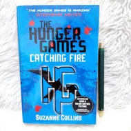 On / The Hunger Games Book 2 - Catching Fire by Suzanne Collins / Dystopian/ YA