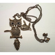 Gold winged owl pendent necklace