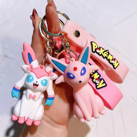 Pokémon Big Eevee Family Keychain Gift Set, Complete Evolution PVC Keychain with Pokéball Clip, Ador