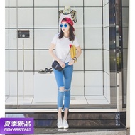 New woman summer knee ripped jeans Flash foot nine eight beggar pants denim pants Korean slim surge