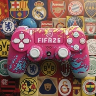 PS4 Game Controller FIFA26 EA Sports motif pink accent biru