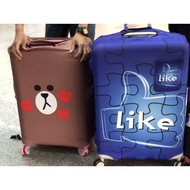 Size 18-32 inches, luggage cover, stretchable, brown kiss pattern.