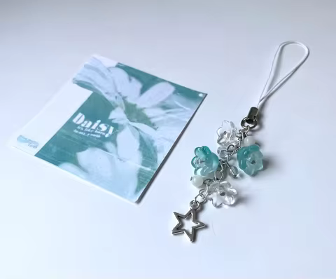 wave to earth daisy phone charm | handmade beaded phone charm | phone accessories | w2e merch | flow