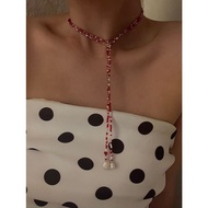 Long dainty beaded garnet necklace
