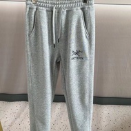 High-quality   Arcteryx Classic Print Sweatpants Men's & Women's Loose Fit Casual Plus Size Cotton P