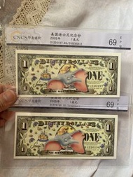 二張迪士尼紀念鈔，售價700