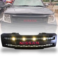 กระจังหน้า หน้ากระจัง มีไฟ LED สีเหลือง รุ่น นิสสัน นาวาร่า NISSAN NAVARA D40 ปี 2005 - 2013 สีดำด้า