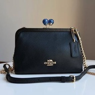 Nora kisslock crossbody bag coach 856