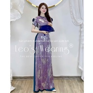 LEOSWEARING Innovative Silk Brocade Ao Dai with Round Neck Design and Floral Hem and Blue Silk Skirt
