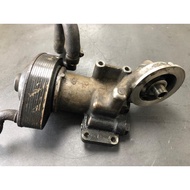 ISUZU 4JB1 Oil Cooler / Oil Filter Housing Used Original