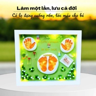 Photo frame set with hand and foot prints for babies