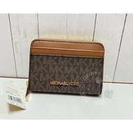 全新MICHAEL KORS JET SET 圓標LOGO印花PVC搭牛皮拉鍊零錢包(橡子棕x深褐)