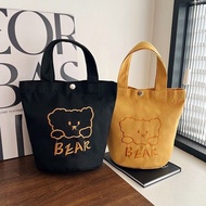 24.5.25 Japanese Style Embroidered Bear Bucket-Shaped Tote Canvas Bag Simple All-Match Small Capacity Portable Lunch Lunch Box Female Bag Japanese Style Embroidered Bear Bucket-Shaped Tote Canvas Bag Simple All-Match Small Capacity Portable Lunch Box Fema