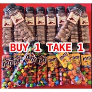 1 KIRKLAND ALMOND USA GET 1 M&M MILK CHOCOLATE USA )
