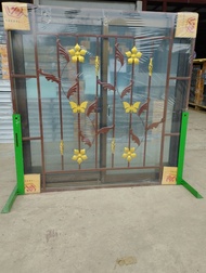 หน้าต่าง 2 บานเลื่อน ขนาด 120x110cm.มีมุ้ง+มีเหล็กดัดลายดอกก้าน