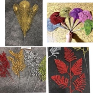 Various glitter branches, bamboo branches, peacock feather branches, tamarind leaf branches, fern br