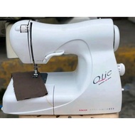 Singer "Qtie" portable sewing machine (Push button)