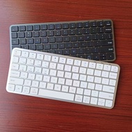 ผู้ผลิตไร้สาย 2.4G คีย์บอร์ดมายากลบลูทูธแบบสองโหมดสำหรับศัพท์มือถือ  magic แท็บเล็ตพีซี คีย์บอร์ดขนา