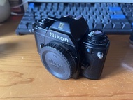Nikon em