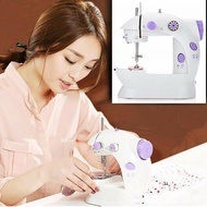 จักรเย็บผ้าขนาดเล็ก พกพาสะดวก รุ่น Mini Sewing Machine  SM-202A (สีม่วง) แถมฟรี อุปกรณ์เย็บผ้า