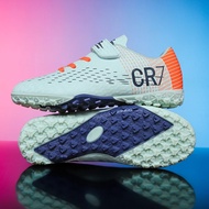 A pair of children's four-season leather football shoes with studs, wear-resistant football shoes, s