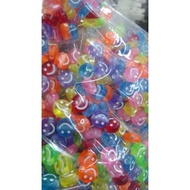 50 GRAMS OF COLORED SCOOP BEADS