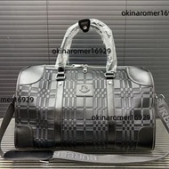 Burberry巴寶莉壓花旅行袋經典格紋設計手提包袋黑色