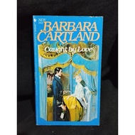 CAUGHT BY LOVE BY BARBARA CARTLAND
