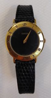 Gucci 黑色金環手錶