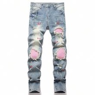 กางเกงยีนส์ผู้ชายขาดสีบล็อกกระเป๋าทแยงลำลองอเนกประสงค์ กางเกงยีนส์ผ้าฝ้ายลายหมึกสาด กางเกงยีนส์ปักลา