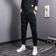 Quần Jogger Nam Kaki Trơn Cạp Chun Bo Gấu Hai Màu Đen Xám Mặc Đi Chơi Thể Thao ĐI Học