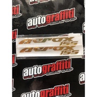 Aerox 155 name Chrome Gold sticker 5x0.7”