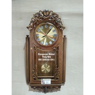 jam dinding hias oval jati antik musik (lemari jam,hiasan dinding)