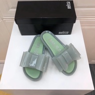 Melissaรองเท้าสตรีMelissa 2024 รองเท้าแตะฤดูร้อนใหม่ผู้หญิงรองเท้าแตะชายหาดวันหยุดโบว์แบน