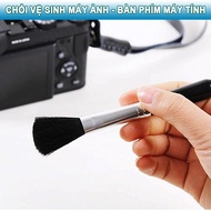 Camera cleaning brush - camera lens - computer keyboard