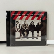 1 CD MUSIC International U2//HOW TO DI DISMANTLE AN ATOMIC BOMB (C6E23)