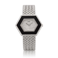 Piaget Piaget. A white gold diamond set manual wristwatch. circa 1970's